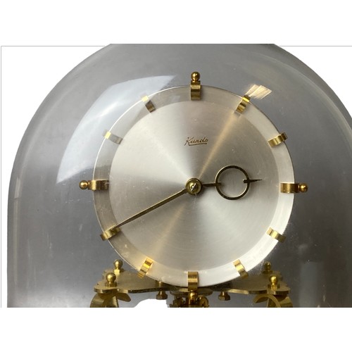 109 - A vintage Kundo (Kieninger & Obergfell) Anniversary clock under glass dome. 23cm wide x 24cm tall