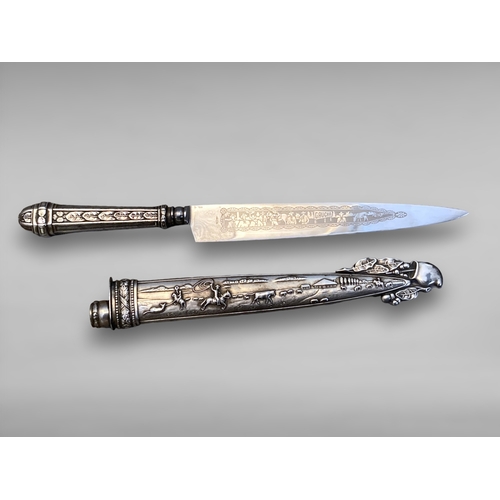 230 - An Argentinean (Facon) Gaucho Silver Plated Belt Knife and cast sheath.
31.5cm long.