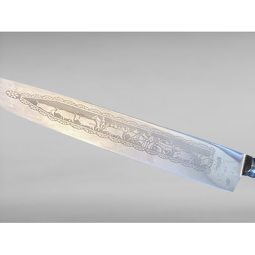 230 - An Argentinean (Facon) Gaucho Silver Plated Belt Knife and cast sheath.
31.5cm long.