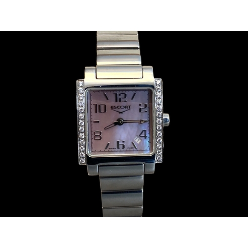 23 - A boxed Escort of Switzerland ladies Wristwatch.
Purchased in Abu Dhabi in 2002.