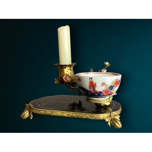 77 - A scarce Louis XV type Meissen tea bowl candlestick centrepiece. 18th-century.
Mounted with a Chinoi... 