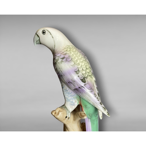 79 - A Royal Dux porcelain Parrot figurine.
Designed by V. Daniel.
29.5cm Tall.