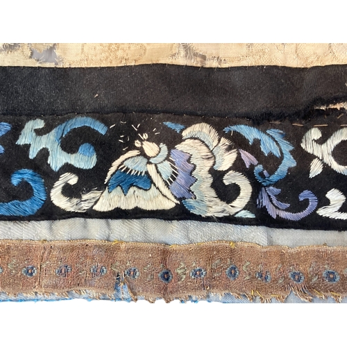 183 - AN 18TH/19TH CENTURY CHINESE 'FORBIDEN STITCH' EMBROIDERED PANEL. UNFRAMED.
SOME DAMAGES. 
52 X 39CM