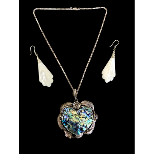 49 - A LARGE SILVER & ABALONE PENDANT TOGETHER WITH A PAIR OF SHELL DROP EARRINGS. 
PENDANT MEASURES - 85... 