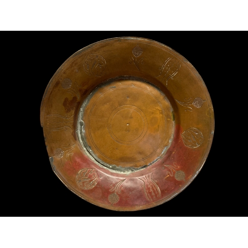 69 - A COLLECTION OF FOUR TINNED COPPER OTTOMAN EMPIRE DISHES.
LARGEST 30CM DIAMETER