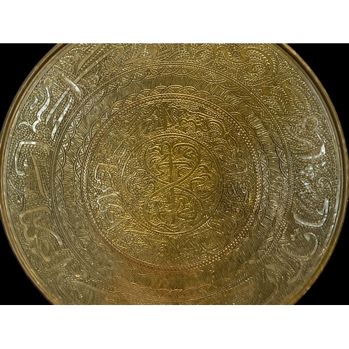 70 - TWO LARGE VINTAGE PERSIAN BRASS TABLE TRAYS. 
LARGEST MEASURES - 59CM DIAMETER