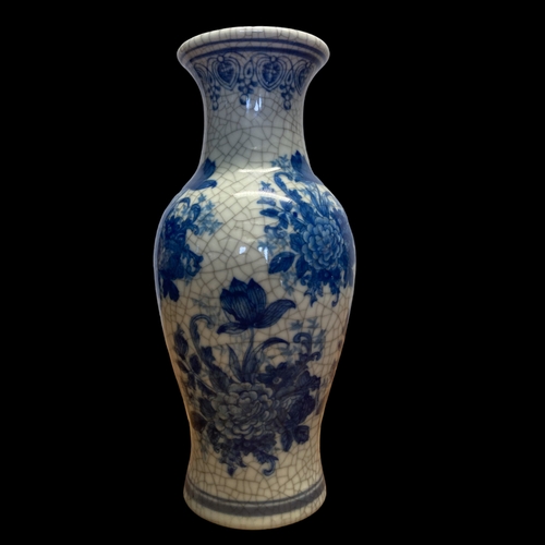 173 - TWO CHINESE HAND PAINTED BLUE & WHITE VASES. CRACKLE GROUNDS, ONE PAINTED WITH SEASIDE LANDSCAPE AND... 