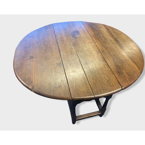 6 - A Large Georgian Oak Gate leg (Drop-leaf) table. 1.45metres x 1.4 metres