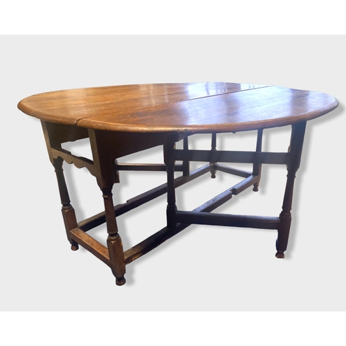 6 - A Large Georgian Oak Gate leg (Drop-leaf) table. 1.45metres x 1.4 metres