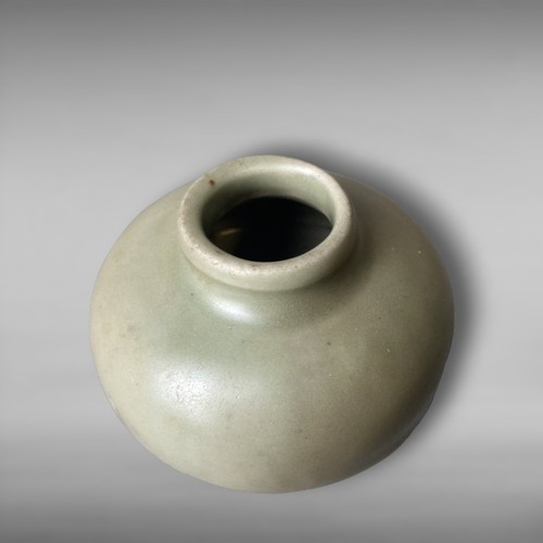 218 - A Chinese Song / Yuan dynasty Longquan Celadon brush washer jarlet.
6 x 7.5cm