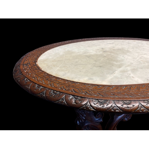 19A - A 19TH CENTURY CONTINENTAL CARVED MAHOGANY & MARBLE TOP OCCASIONAL TABLE. 
71 TALL X 72CM WIDE