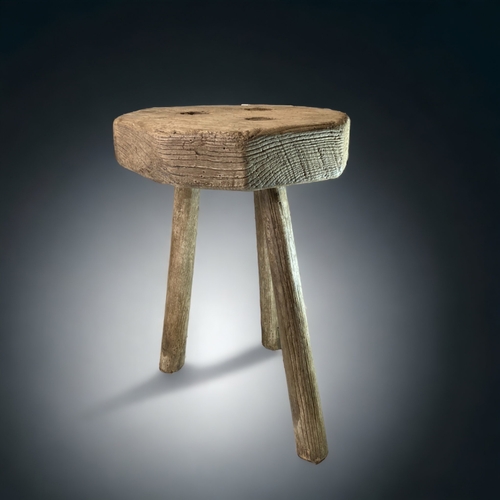 2 - A 19TH CENTURY RUSTIC WELSH MILKING STOOL. 
33CM TALL