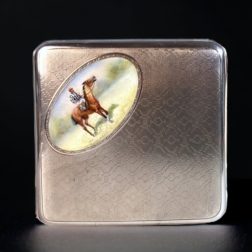 28 - A VINTAGE STERLING SILVER & ENAMEL 'RACEHORSE' CIGARETTE CASE. GILDED INTERIOR AND CABOCHAN BUTTON.
... 