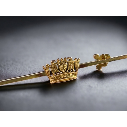 52 - A 9CT GOLD TIE PIN, TOGETHER WITH 2 UNTESTED WATCH FOBS.