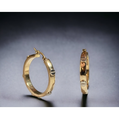 36 - A 9CT GOLD HOOP EARRINGS, IN THE CARTIER LOVE STYLE.
30MM