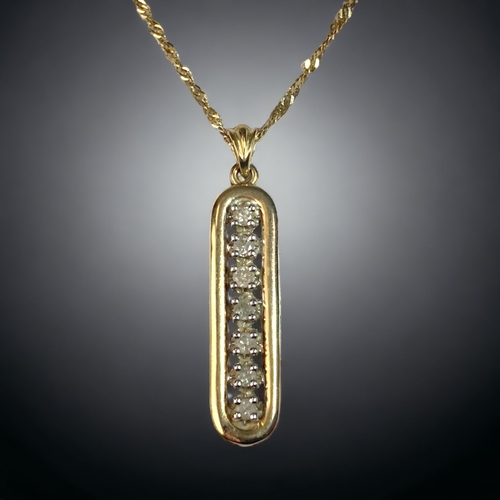 46 - A 9CT GOLD & DIAMOND PENDANT NECKLACE.
PENDANT - 30MM LONG.