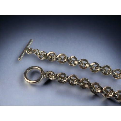 47 - A 925 SILVER WATCH CHAIN WITH T.BAR. 
45CM LONG.
66G.