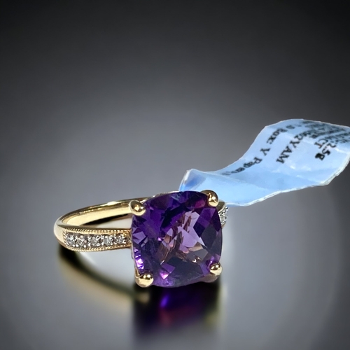 49 - A 14CT GOLD LADIES AMETHYST & DIAMOND RING. 
SIZE N.
BNWT.