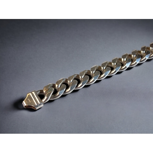 62 - A 925 SILVER FLAT LINK ID BRACELET. 
20CM LONG.
62G.