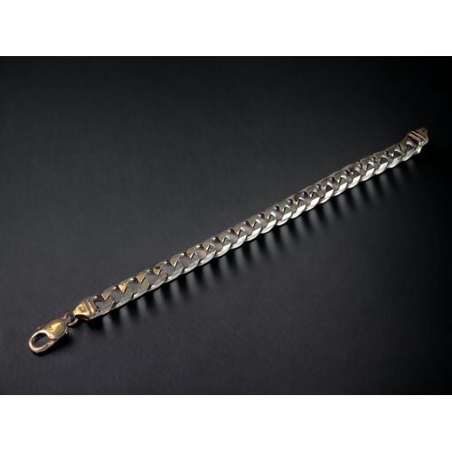 63 - A 925 SILVER FLAT LINK BRACELET. 
21.5CM LONG.