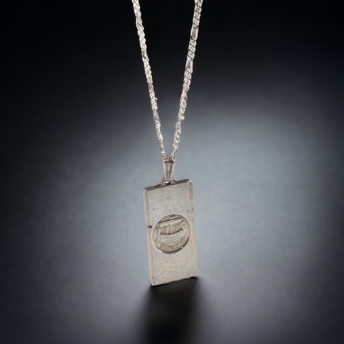 64 - A 925 SILVER INGOT PENDANT & SILVER CHAIN.
37 X 15MM