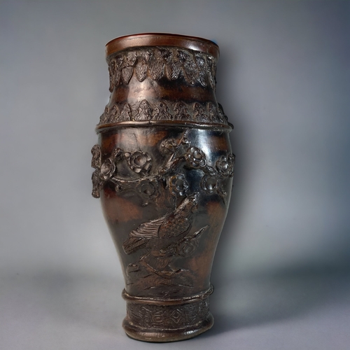 165 - A CHINESE CAST BRONZE VASE.
RELIEF DECORATED WITH BIRDS ON ROCK & CHERRY OUTCROPS. 
SIGNED TO BASE.
... 