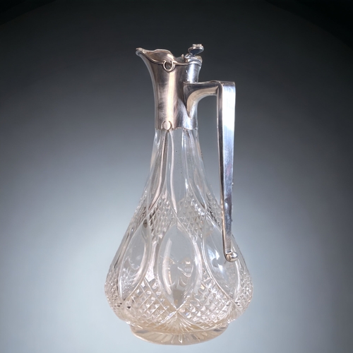 94 - A 925 SILVER & CUT GLASS CLARET JUG. 
LONDON H/M.
24CM TALL.