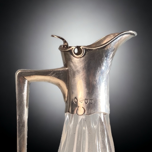 94 - A 925 SILVER & CUT GLASS CLARET JUG. 
LONDON H/M.
24CM TALL.