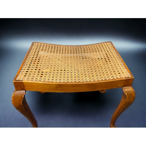 5 - A QUEEN ANNE STYLE CANE SEATED STOOL. 
44CM TALL.