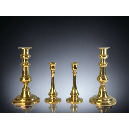 109 - TWO PAIRS OF 19TH CENTURY BRASS CANDLESTICKS.
TALLEST - 20.5CM