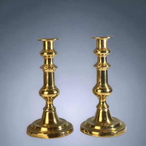 109 - TWO PAIRS OF 19TH CENTURY BRASS CANDLESTICKS.
TALLEST - 20.5CM