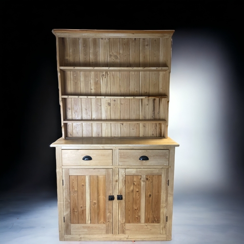 9 - A VINTAGE WAXED PINE WELSH DRESSER.
WITH BOARDED UPPER SHELVES & TWO DRAWERS AND CLOSED CUPBOARDS.