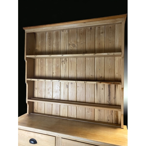 9 - A VINTAGE WAXED PINE WELSH DRESSER.
WITH BOARDED UPPER SHELVES & TWO DRAWERS AND CLOSED CUPBOARDS.