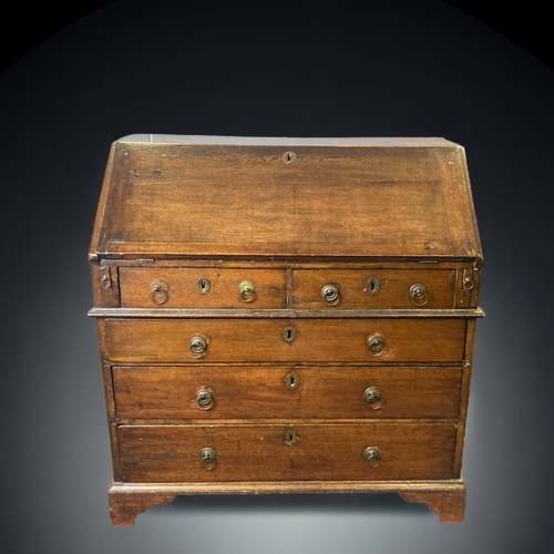 11 - AN EARLY 19TH CENTURY MAHOGANY WRITING BUREAU WITH FITTED INTERIOR. 91 cms wide, 98 cms high and 58 ... 