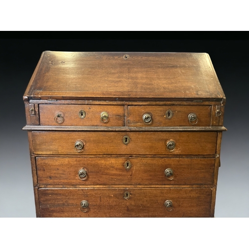 11 - AN EARLY 19TH CENTURY MAHOGANY WRITING BUREAU WITH FITTED INTERIOR. 91 cms wide, 98 cms high and 58 ... 