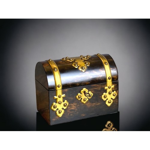 108A - A Victorian Coromandel dome topped perfume box. 
Circa 1870.
With decorative brass mounts. 
Interior... 