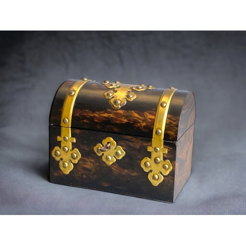 108A - A Victorian Coromandel dome topped perfume box. 
Circa 1870.
With decorative brass mounts. 
Interior... 