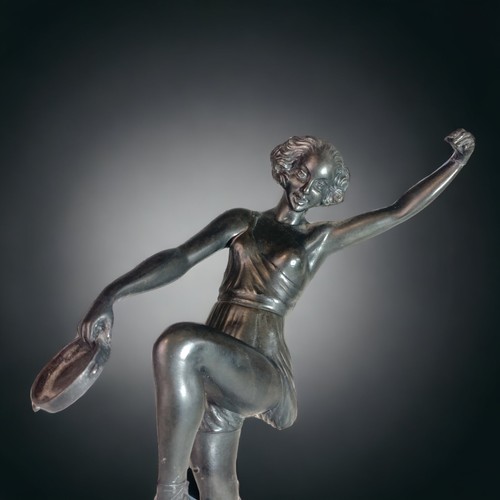 112 - AN ART DECO FAYRAL (PIERRE LE FAGUAYS) MARKED SPELTER FIGURE OF 'DANCER WITH CYMBALS'. 
26CM TALL.