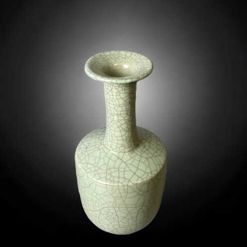 146 - A Chinese Longquan Celadon Crackle Glaze mallet vase.
24cm Tall