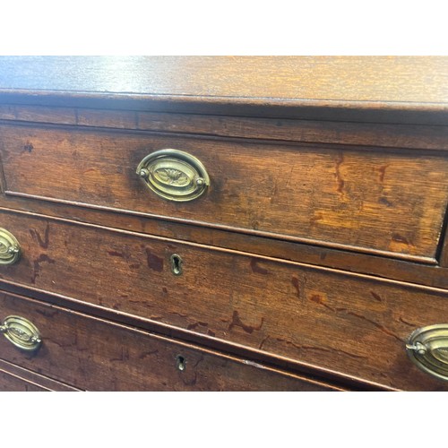 14 - A GEORGIAN OAK BUREAU. CURVED ARC COLUMNS AND BRASS HANDLES. FITTED DRAWER & PIGEON HOLE INTERIOR.
9... 