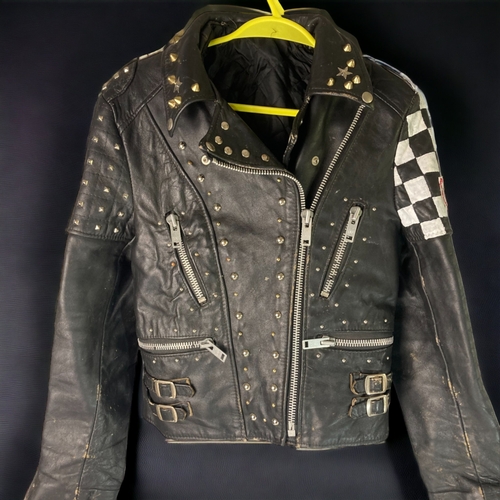 397 - A ladies leather bikers jacket. 
'cafe racer - ton up boys'
made in the UK / size 12.