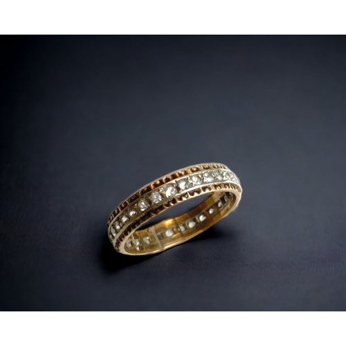 88 - A 9 carat gold & Diamond full eternity ring. 
Yellow & white gold band set with diamonds. 
Marked 9K... 