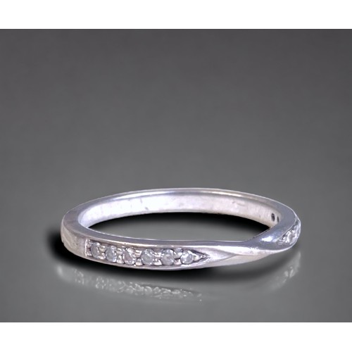 89 - A 9 carat gold & Diamond Half Eternity ring.
UK size M 1/2.