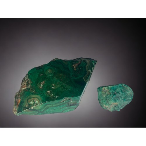 100 - TWO LARGE JEWELLER'S BLOCKS OF PURE MALACHITE. 
LARGEST MEASURES 12.5 X 7 X 4CM