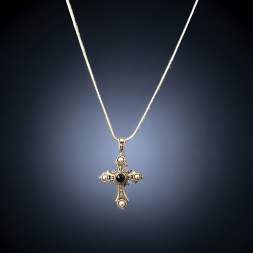 102 - A VINTAGE SILVER & CABOCHON SET CROSS PENDANT. WITH A SILVER NECKLACE.
PENDANT MEASURES - 50 X 30MM