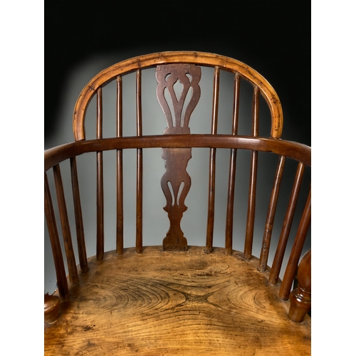 32 - AN EARLY 19TH CENTURY YEW & ELM LOW WINDSOR CHAIR.
86CM TALL