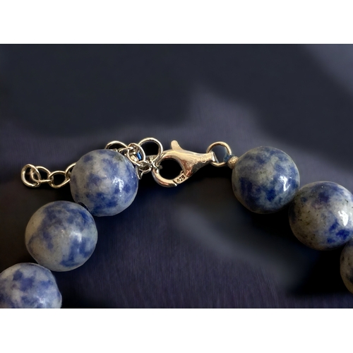 70 - A LADIES 925 SILVER & LAPIS LAZULI LADIES BRACELET. 
21CM