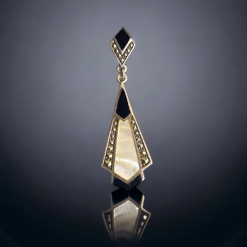 88 - AN ART DECO STYLE SILVER & BLACK ONYX, MARCASITE & M.O.P PENDANT. 
46MM LONG.