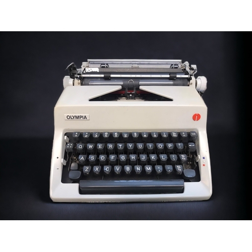 380 - THREE VINTAGE TYPEWRITERS. INCLUDING OLYMPIA, IMPERIAL & BROTHER. WITH CASES.