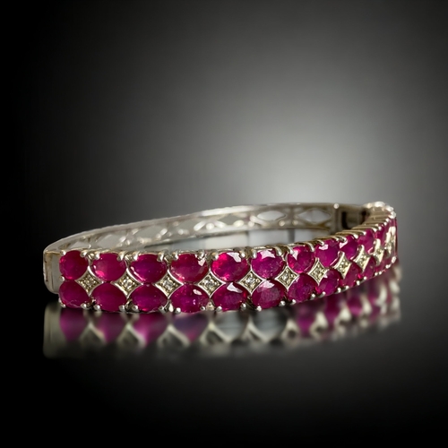 111 - A STERLING SILVER, PINK SAPPHIRE & DIAMOND LADIES BRACELET.